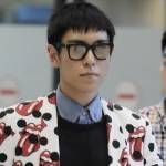 T.O.P (Big Bang) diễu qua sân bay với áo len dưới trời 32 độ